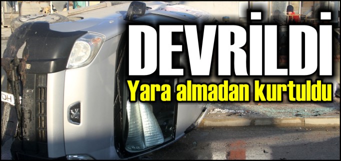 DEVRİLEN KAMYONETTEN YARA ALMADAN KURTULDU
