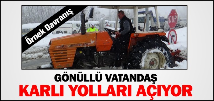 GÖNÜLLÜ VATANDAŞ KARLI YOLLARI AÇIYOR