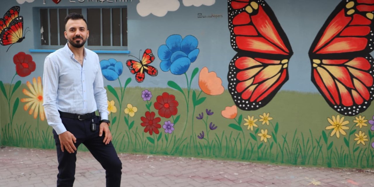 Duvar yazılarından bıkan apartman yöneticisi çareyi sanatta buldu