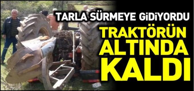 TRAKTÖRÜN ALTINDA KALDI