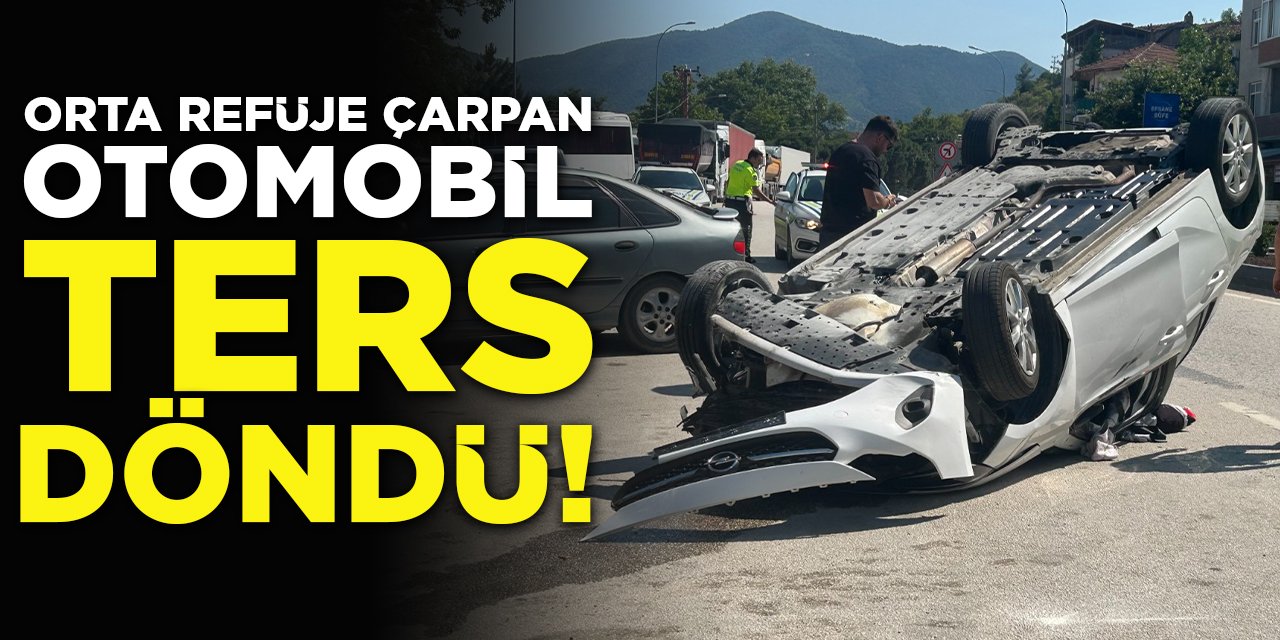 Orta refüje çarpan otomobil ters döndü