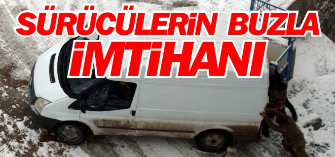 SÜRÜCÜLER BUZ TUTAN YOLDA ZOR ANLAR YAŞADI