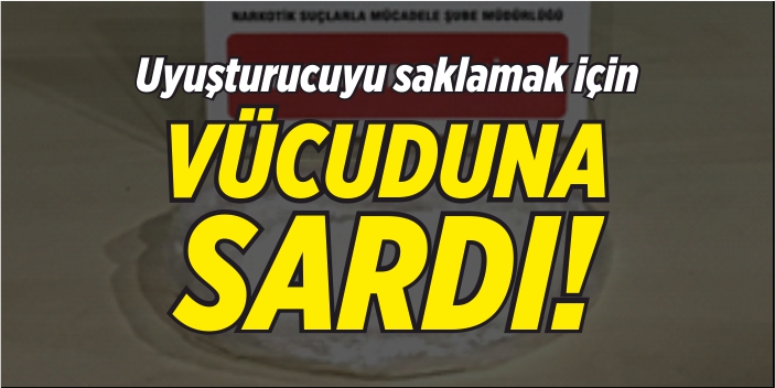 Uyuşturucuyu saklamak için vücuduna sardı