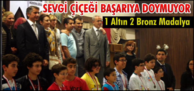 SEVGİ ÇİÇEĞİ BAŞARIYA DOYMUYOR