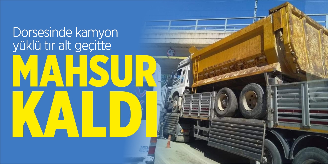 Dorsesinde kamyon yüklü tır alt geçitte mahsur kaldı