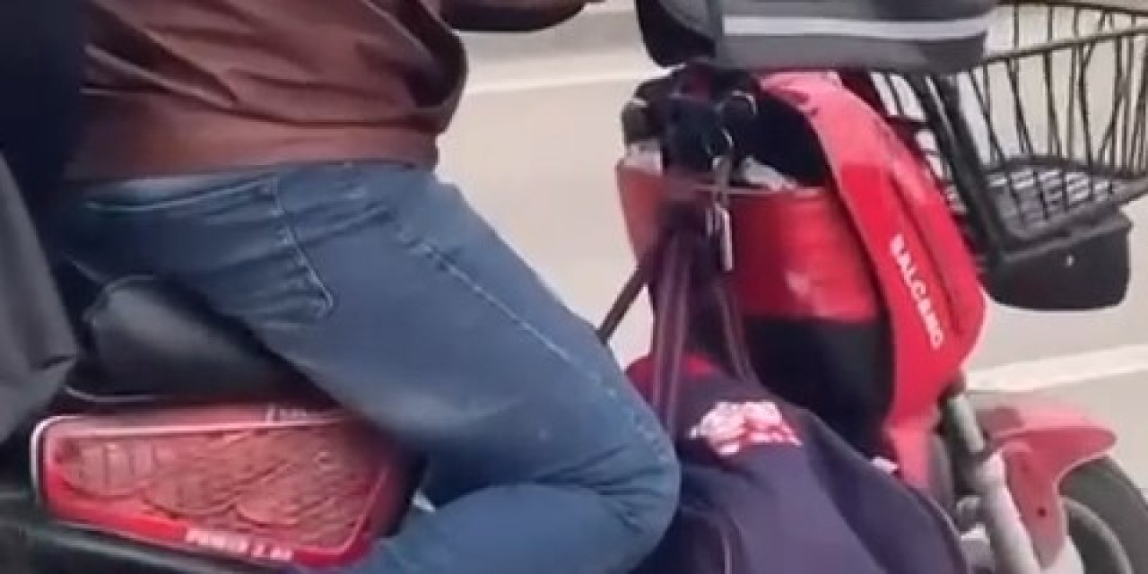 Motosikletin Önüne Bebeğini Koyup Kilometrelerce İlerledi