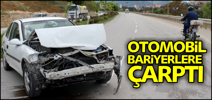 OTOMOBİL BARİYERLERE ÇARPTI