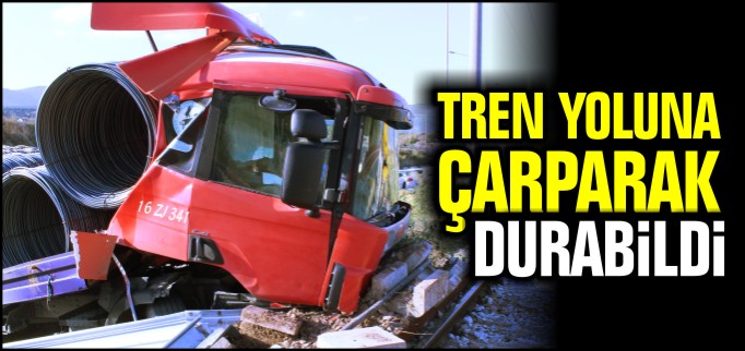 TREN YOLUNA ÇARPARAK DURABİLDİ