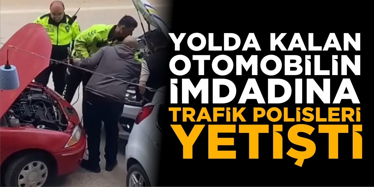 Yolda kalan otomobilin imdadına trafik polisleri yetişti