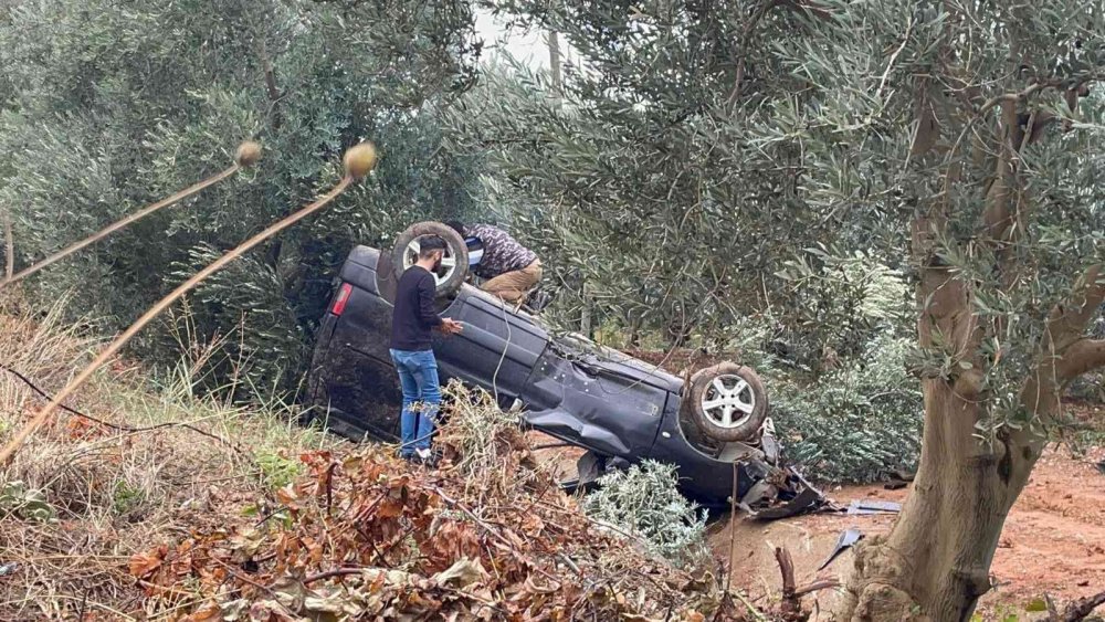 Bursa’da kanala uçan araç takla attı, içindekiler burnu kanamadan kurtuldu